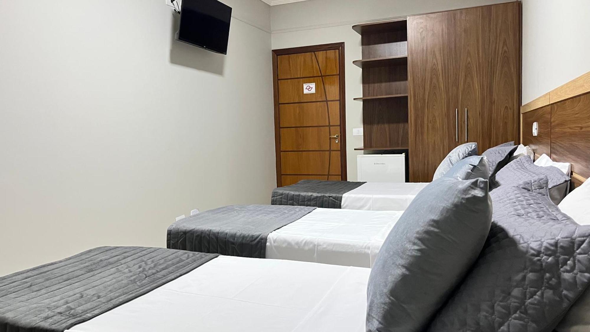 Quarto Triplo com Varanda